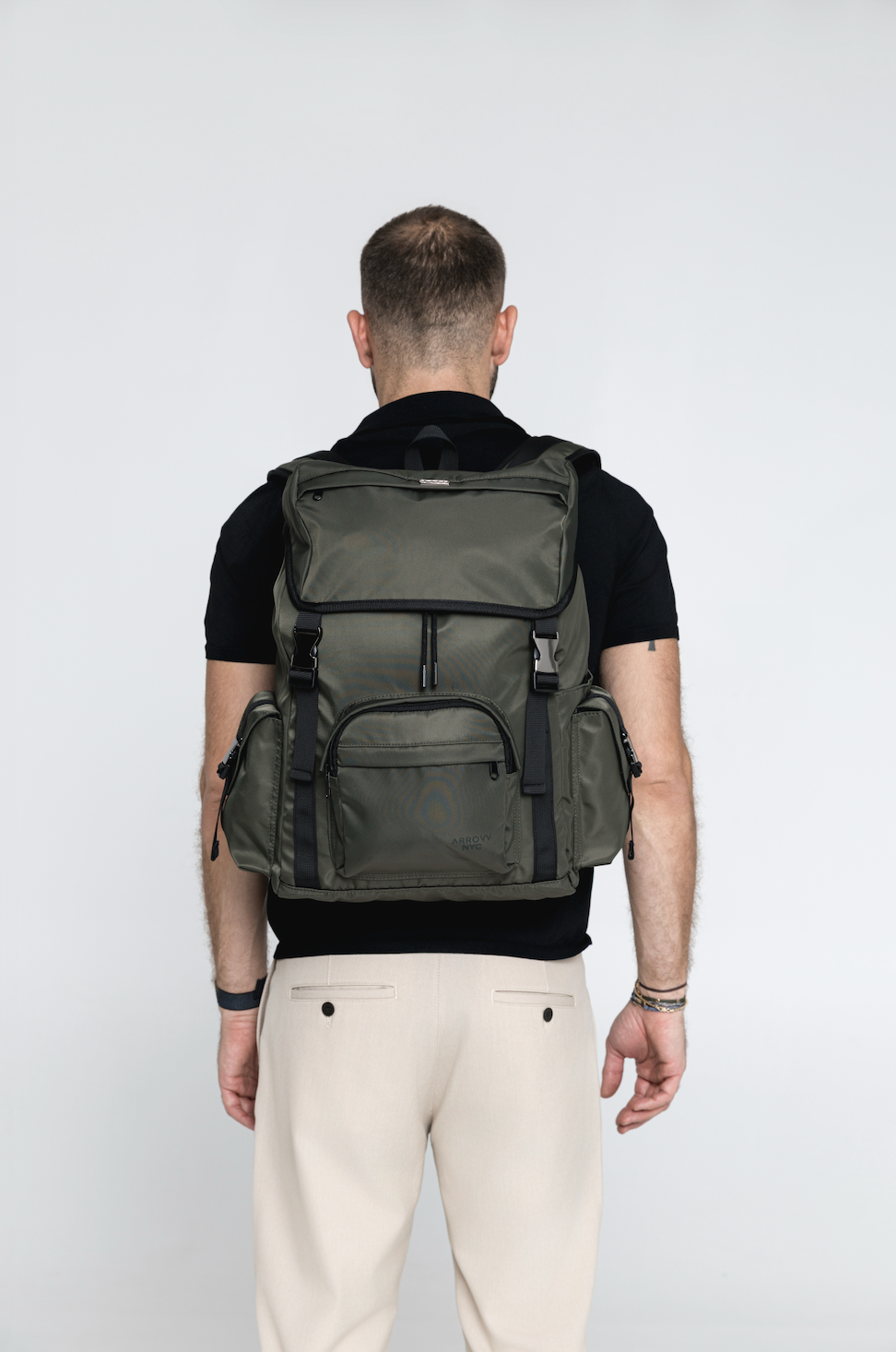 Person wearing the Olive Cruiser, viewed from behind