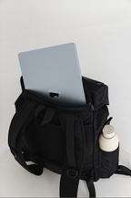 Laptop partly inserted into the Black Cruiser's rear compartment