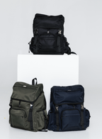 Black, Olive and Deep Blue Cruiser backpacks displayed together