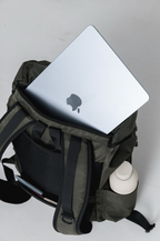 Close-up of the Olive Cruiser's laptop compartment and bottle pocket
