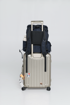 Rear of the Deep Blue Cruiser secured over a rolling suitcase handle