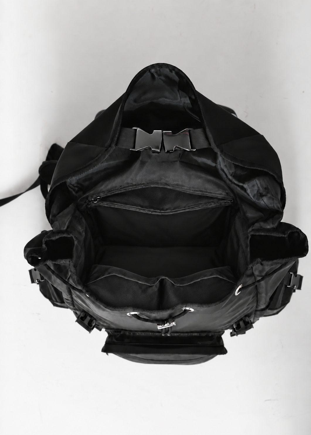 Top view of the open Black ARROW Cruiser, showing two interior organizer pockets and an interior zippered pocket.